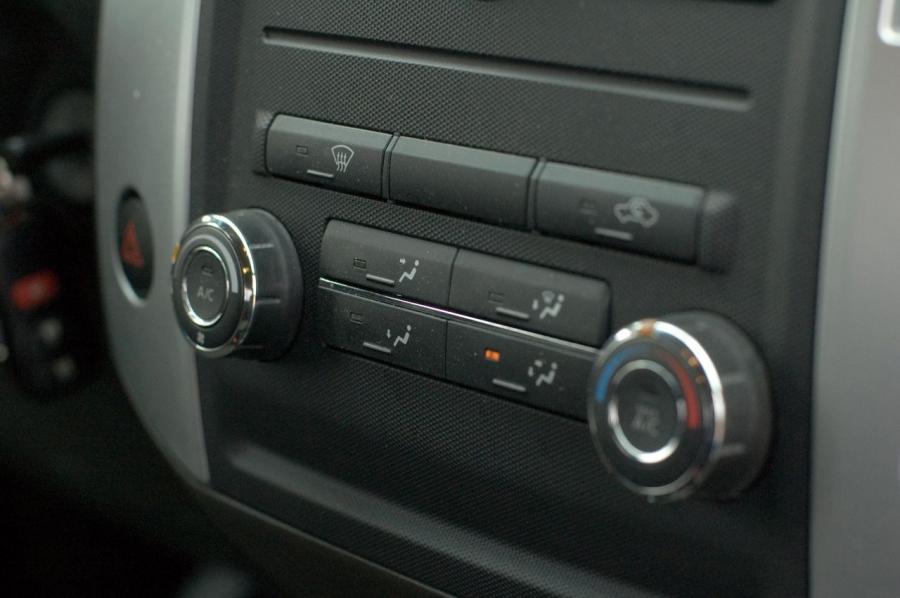  Nissan Frontier 2009 года  (фото 36 из 65)